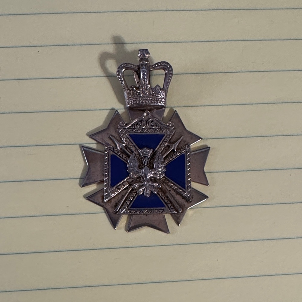 Royal Blue and Silver Emblem with Crown